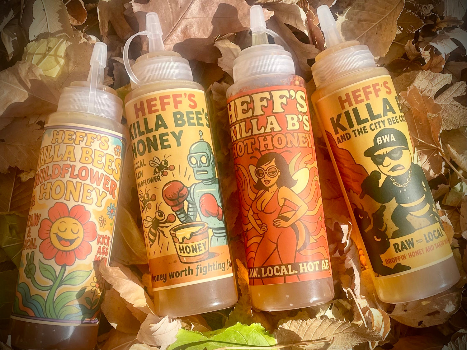 Four bottles of Heff's Killa B's Honey on a leafy background