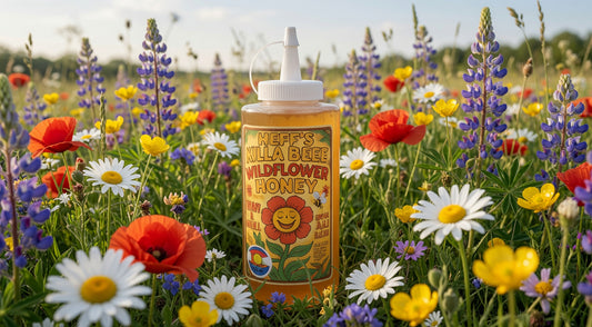 Heff's Wildflower Honey bottle in a field of wildflowers